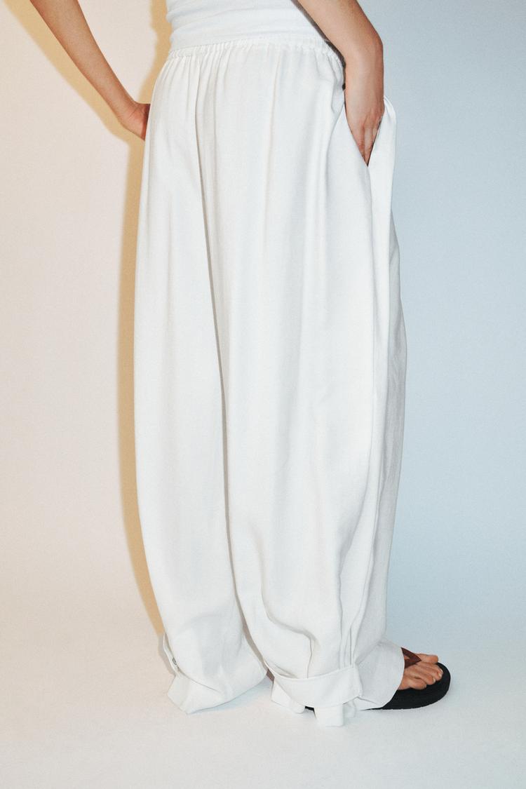 FLOWING TROUSERS WITH ADJUSTABLE HEM