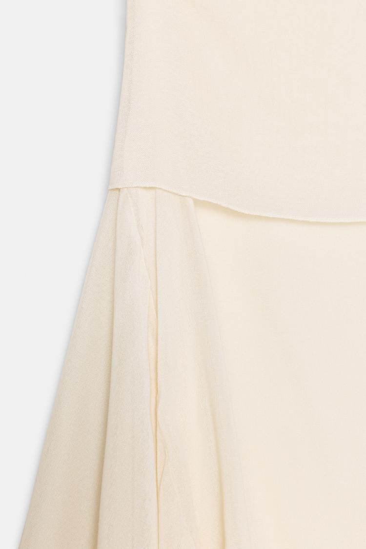 ASYMMETRIC FLOWING SKIRT