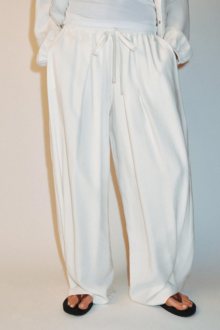 FLOWING TROUSERS WITH ADJUSTABLE HEM
