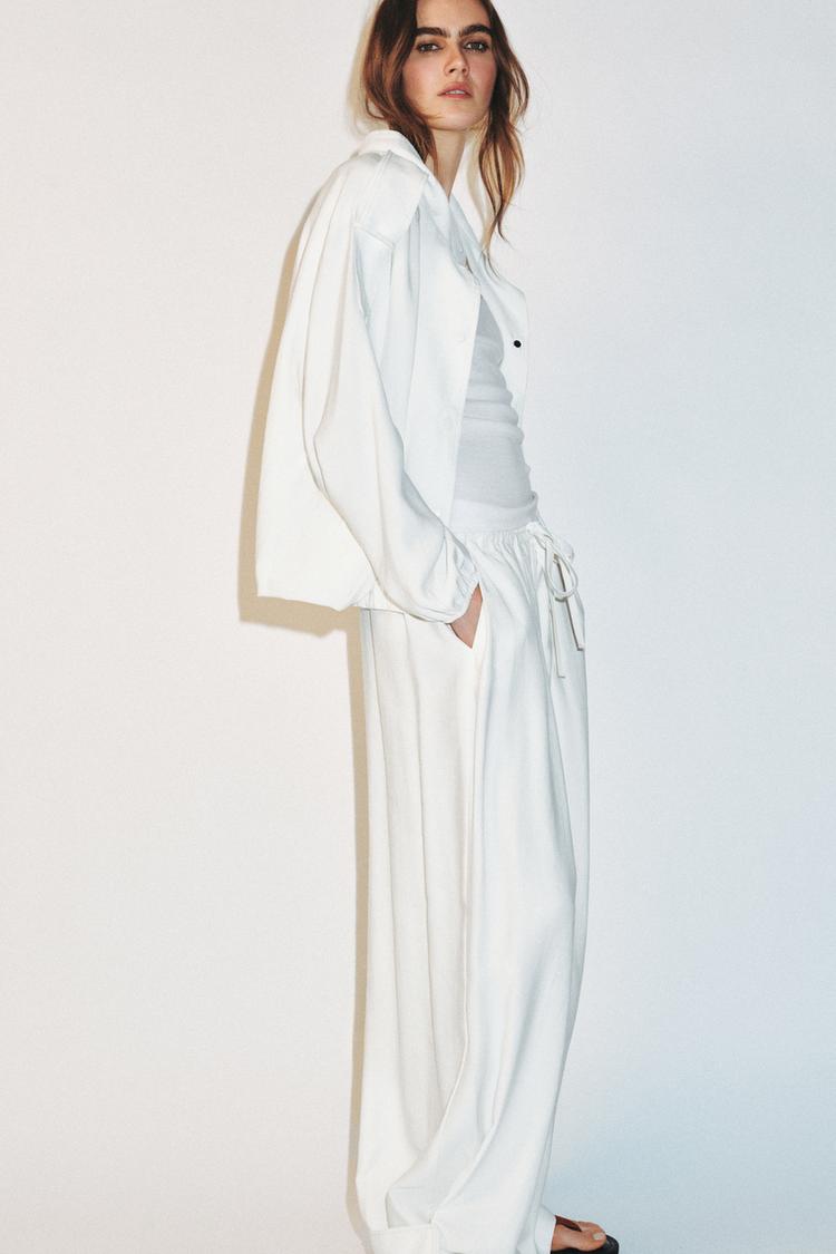 FLOWING TROUSERS WITH ADJUSTABLE HEM
