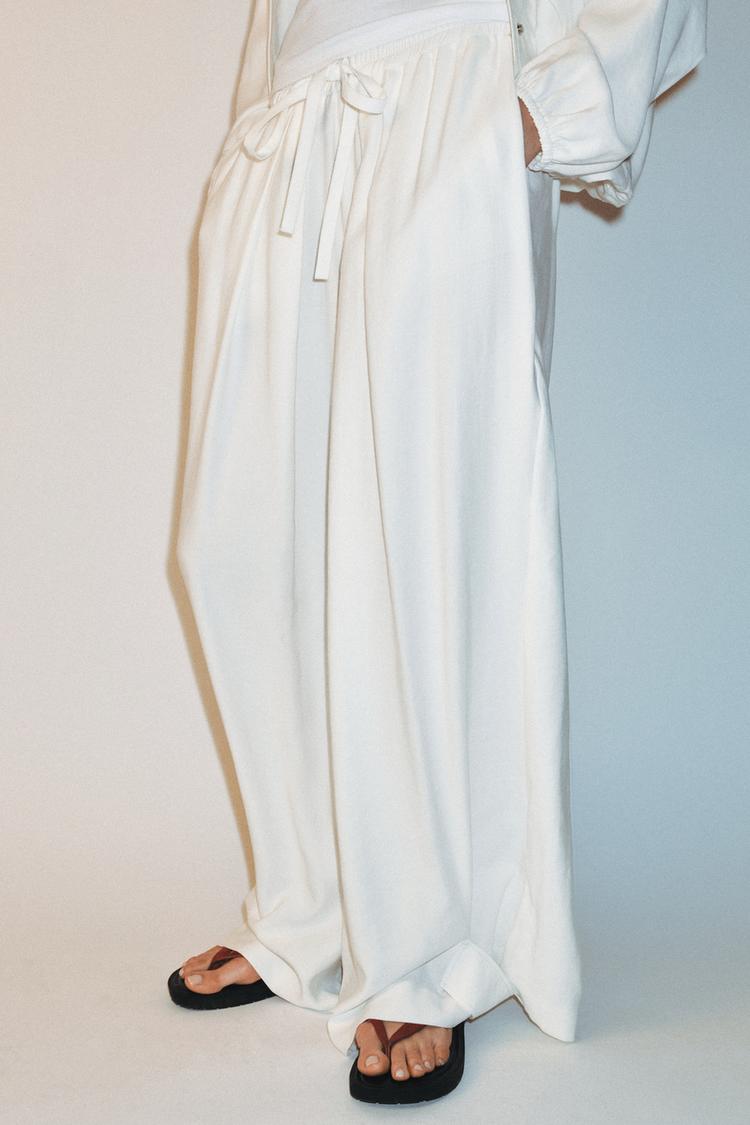 FLOWING TROUSERS WITH ADJUSTABLE HEM