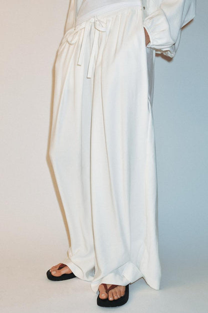 FLOWING TROUSERS WITH ADJUSTABLE HEM