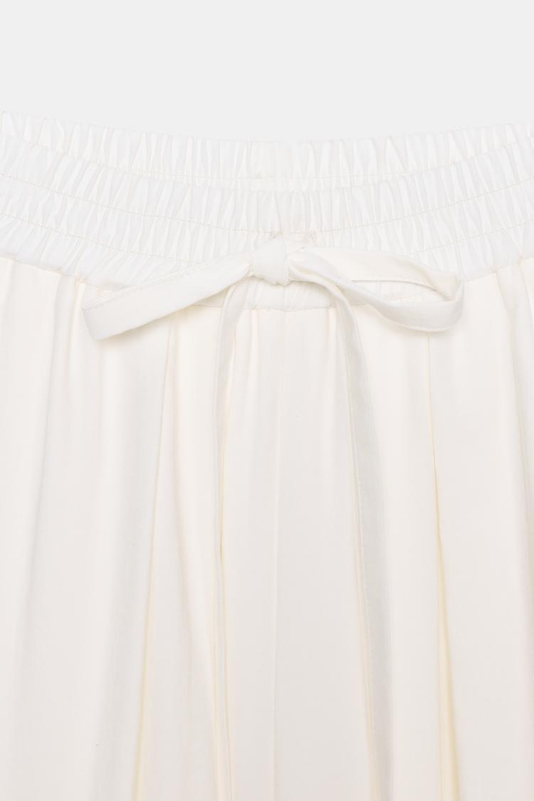 FLOWING TROUSERS WITH ADJUSTABLE HEM