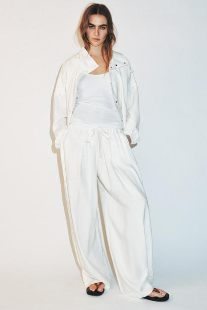 FLOWING TROUSERS WITH ADJUSTABLE HEM