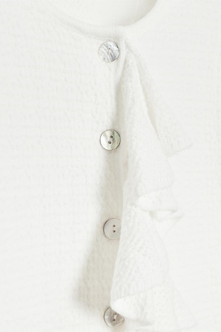 CARDIGAN WITH SHORT SLEEVES AND RUFFLES