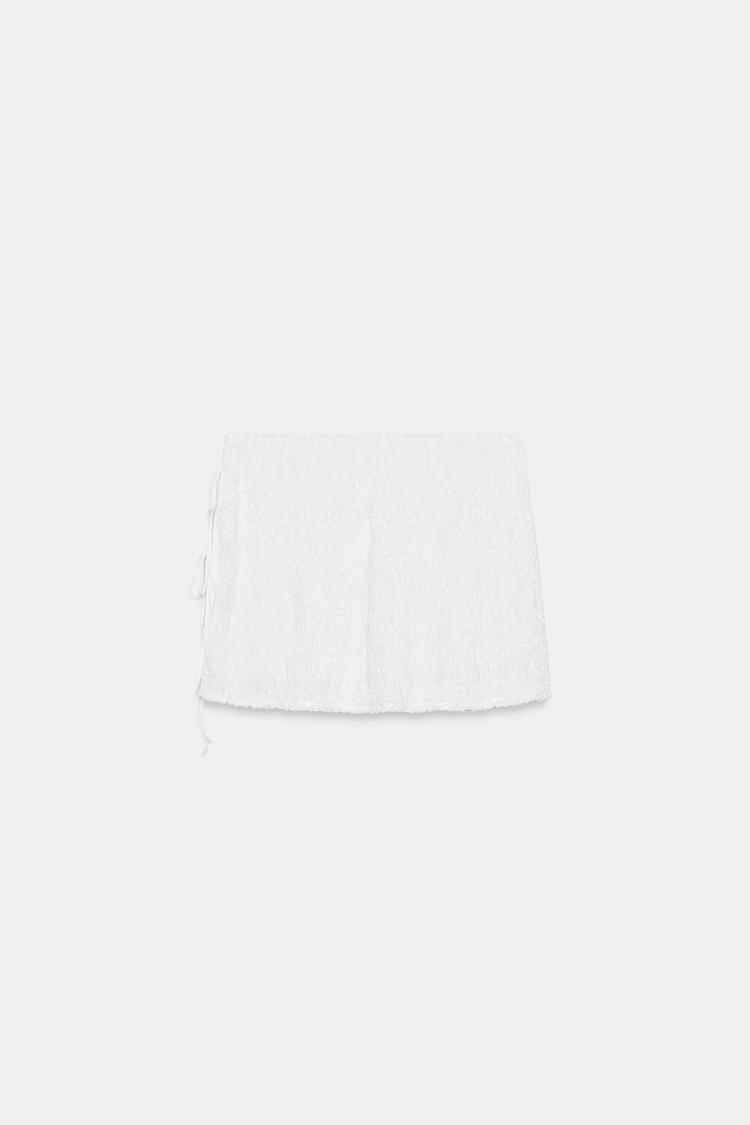 MINI SEQUIN SKIRT WITH BOWS