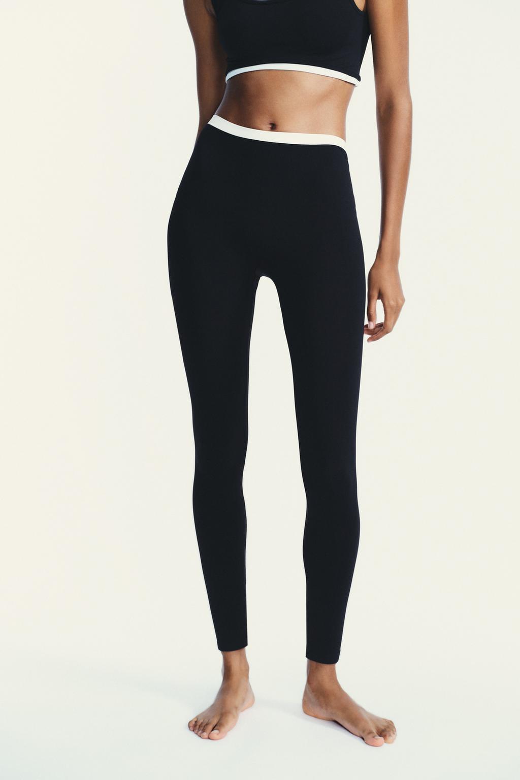 SPORTY DOUBLE EFFECT CROP TOP