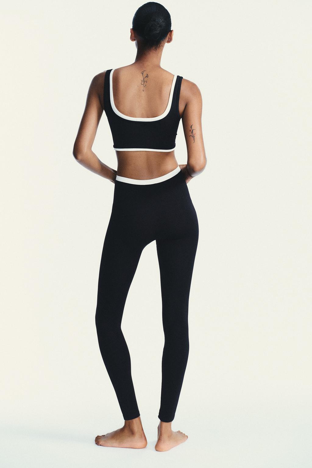 SPORTY DOUBLE EFFECT CROP TOP