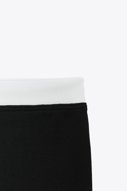 SPORTY DOUBLE EFFECT CROP TOP