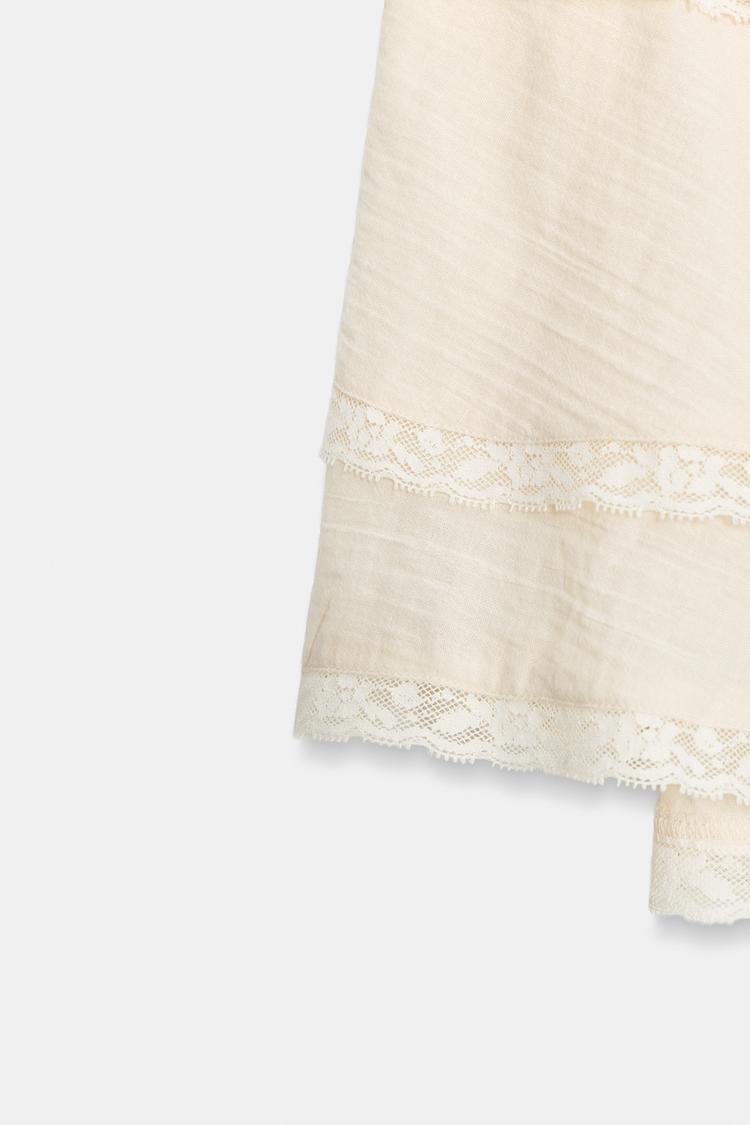 LACE RUFFLE MINI SKIRT