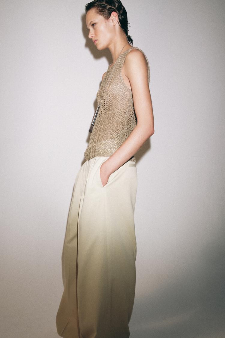 PLEATED WIDE-LEG TROUSERS