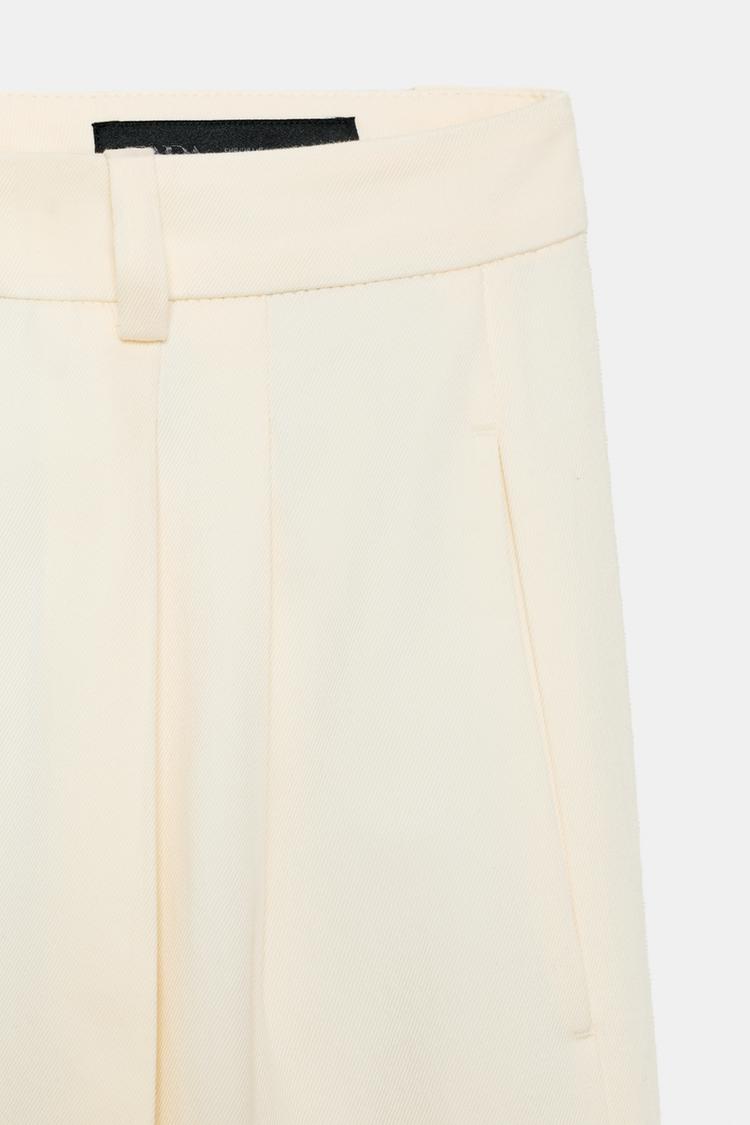 PLEATED WIDE-LEG TROUSERS