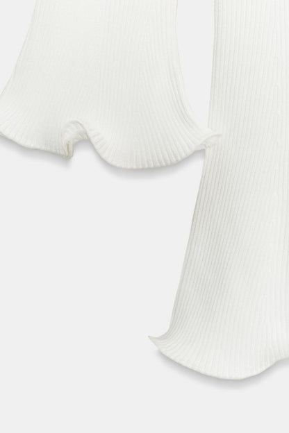 RIBBED KNIT DRESS WITH WAVY HEM