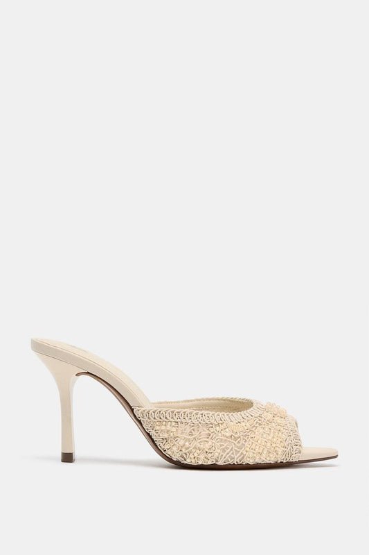 HEELED SANDALS WITH APPLIQUÉS