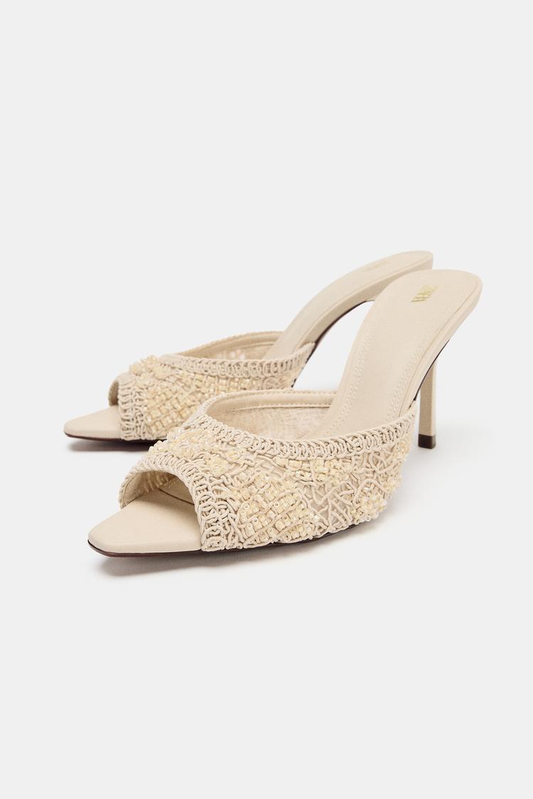 HEELED SANDALS WITH APPLIQUÉS