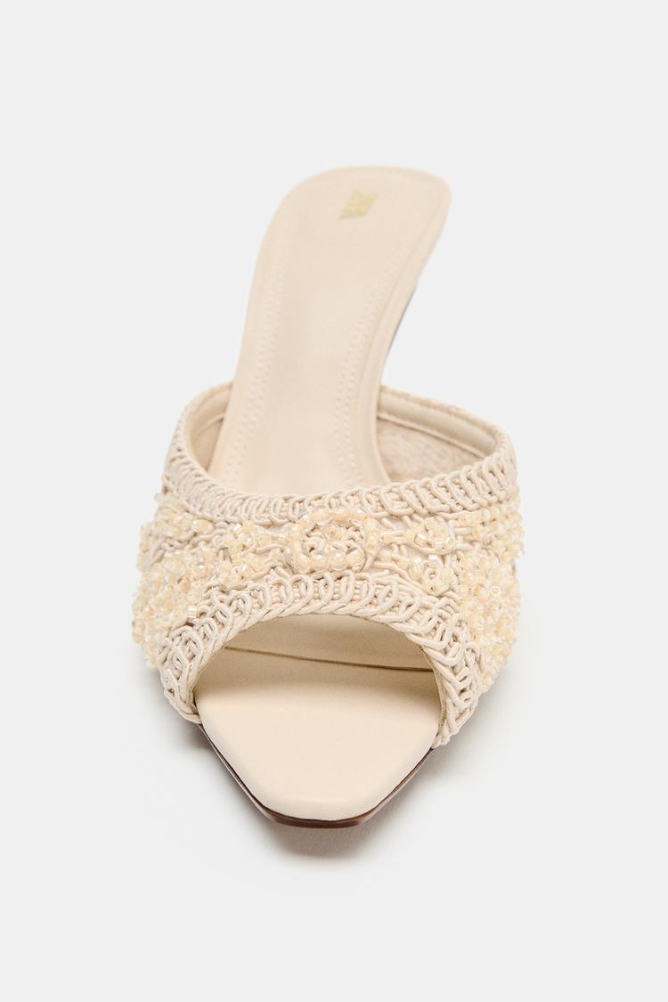 HEELED SANDALS WITH APPLIQUÉS