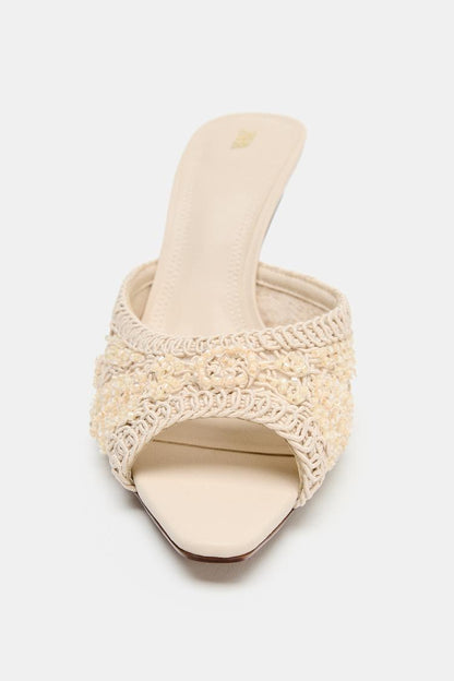 HEELED SANDALS WITH APPLIQUÉS