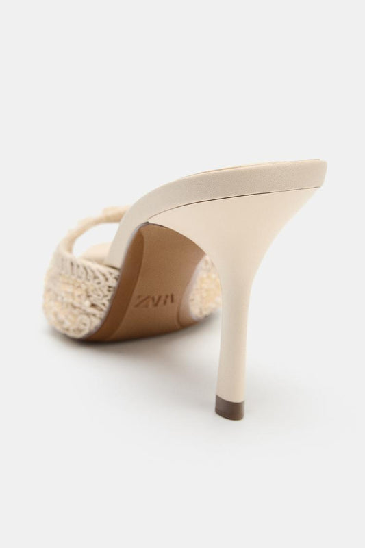 HEELED SANDALS WITH APPLIQUÉS